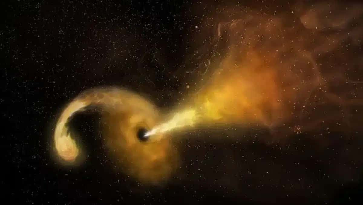 Esta ilustração artística retrata um evento de ruptura de maré, que ocorre quando uma estrela passa perigosamente perto de um buraco negro supermassivo