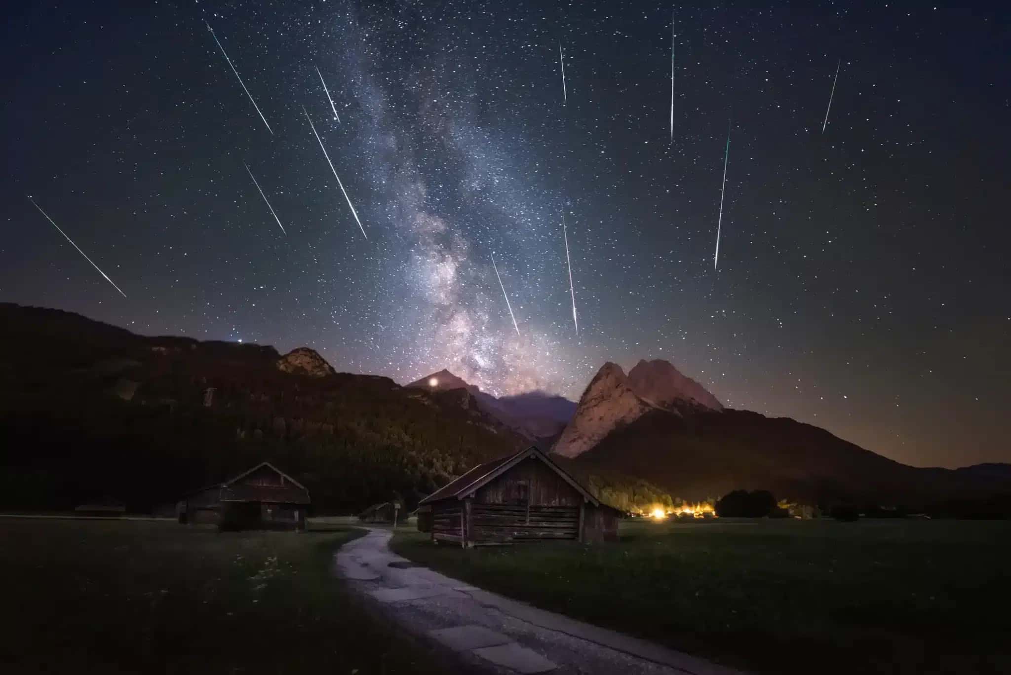 2018 Perseids meteor shower with the Milky way, taken in Garmisch-Partenkirchen in the Alps. Shooting stars are stacked according to their positions in the sky to show the (oppisite) radiant.