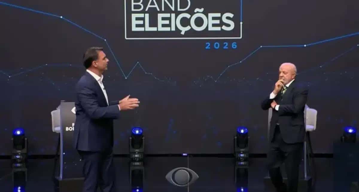 Flávio Bolsonaro (PL) e Luiz Inácio Lula da Silva (PT) em debate da Band.