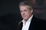 Hugh Grant dorme durante partida de tênis; confira o momento