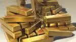 Dólar forte no exterior provoca queda do ouro, que também registra recuo após o susto gerado pela decisão da Fed