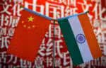 The national flags of India (R) and China are seen at the Delhi World Book fair at Pragati Maidan in New Delhi on January 9, 2016.   AFP PHOTO / CHANDAN KHANNA / AFP / Chandan Khanna        (Photo credit should read CHANDAN KHANNA/AFP via Getty Images)
