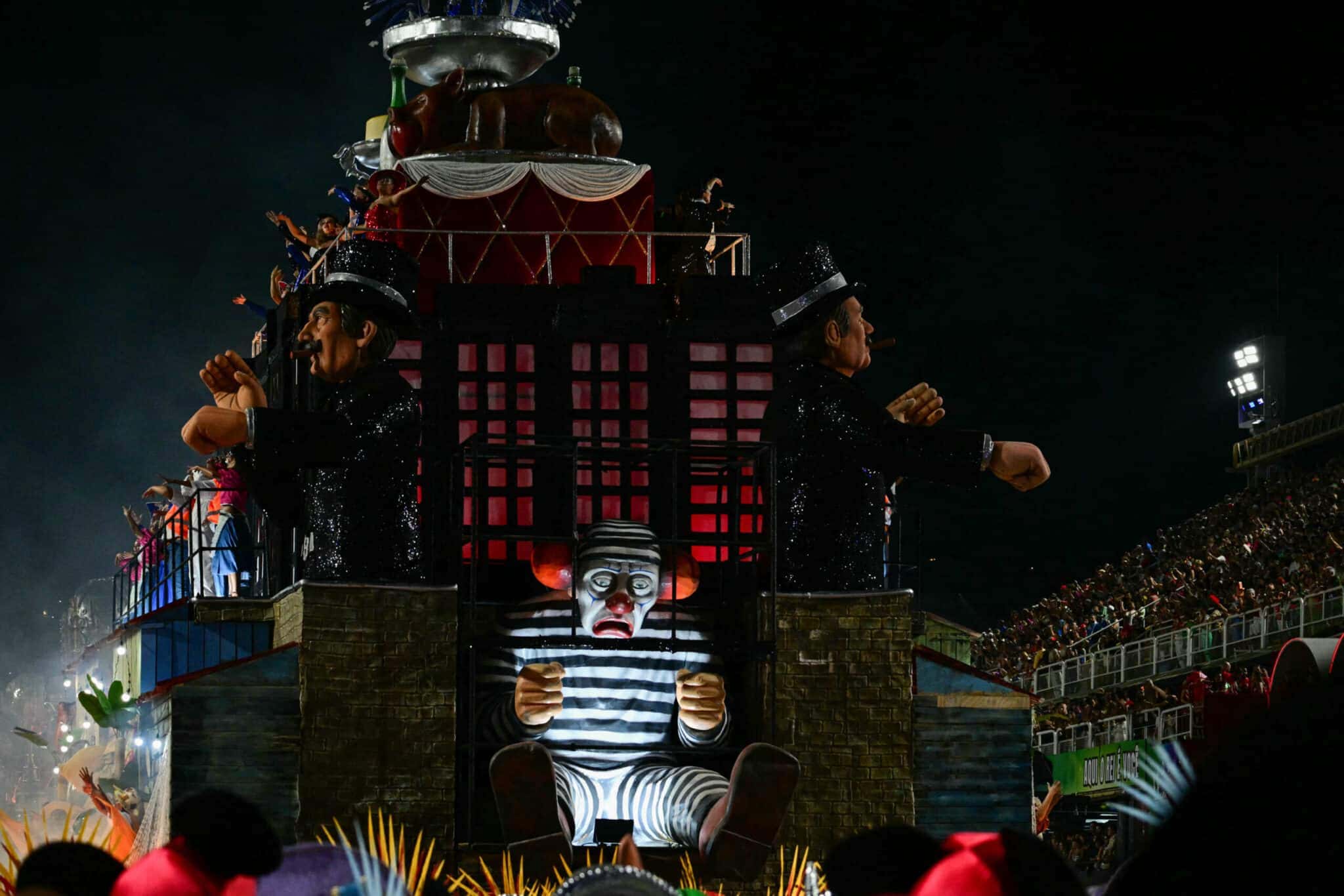 This view shows a float of the Academicos de Niteroi samba school perform during the opening night of the Rio Carnival at the Marques de Sapucai Sambadrome in Rio de Janeiro, Brazil, on February 15, 2026. (Photo by Pablo PORCIUNCULA / AFP)