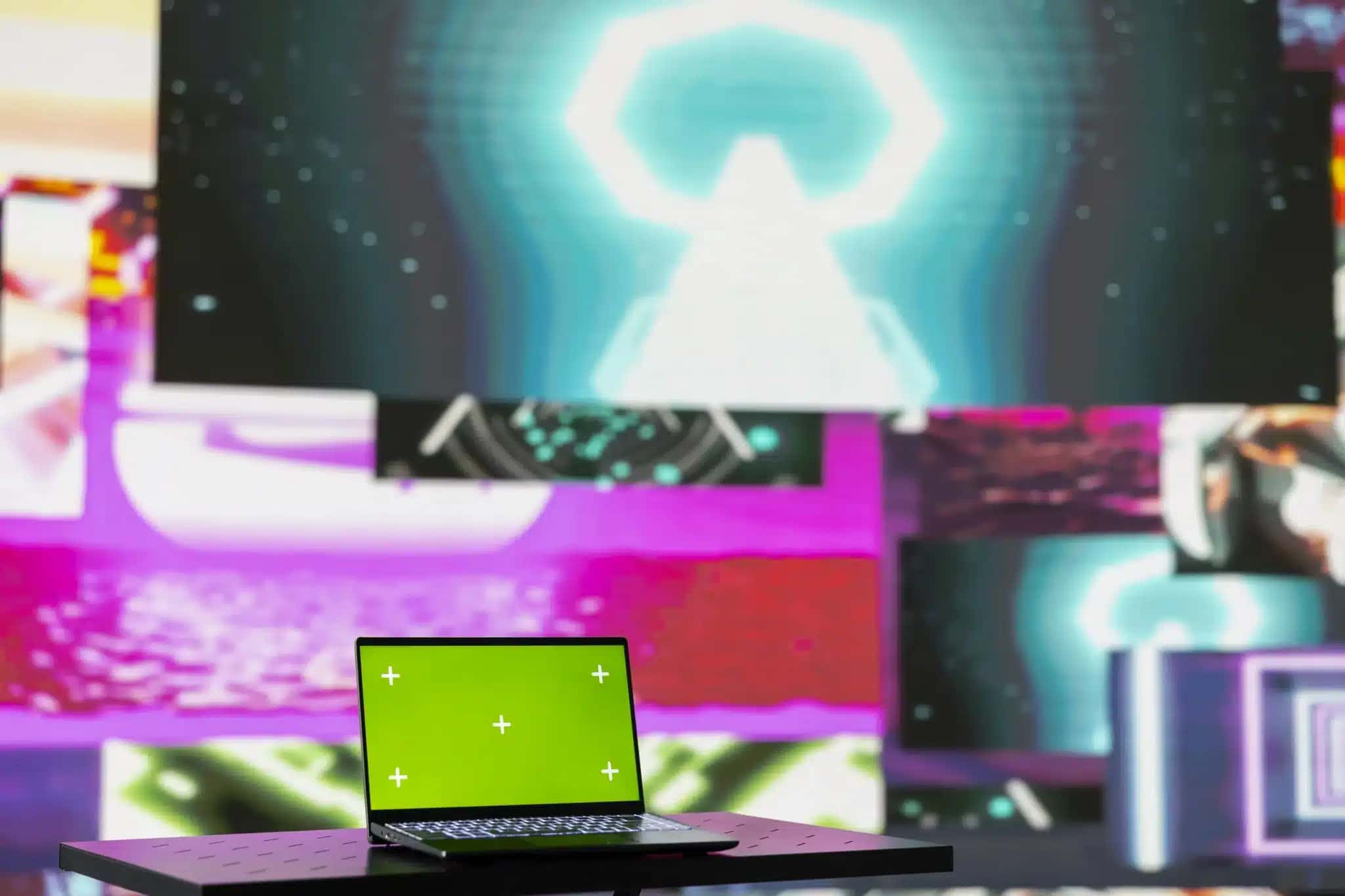 laptop-running-isolated-mockup-screen-surrounded-by-funky-visual-art-clips
