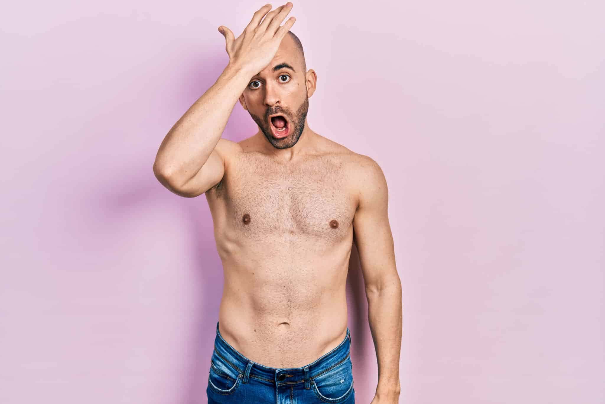young-bald-man-standing-shirtless-surprised-with-hand-head-mistake-remember-error-forgot-bad-memory-concept-scaled-1