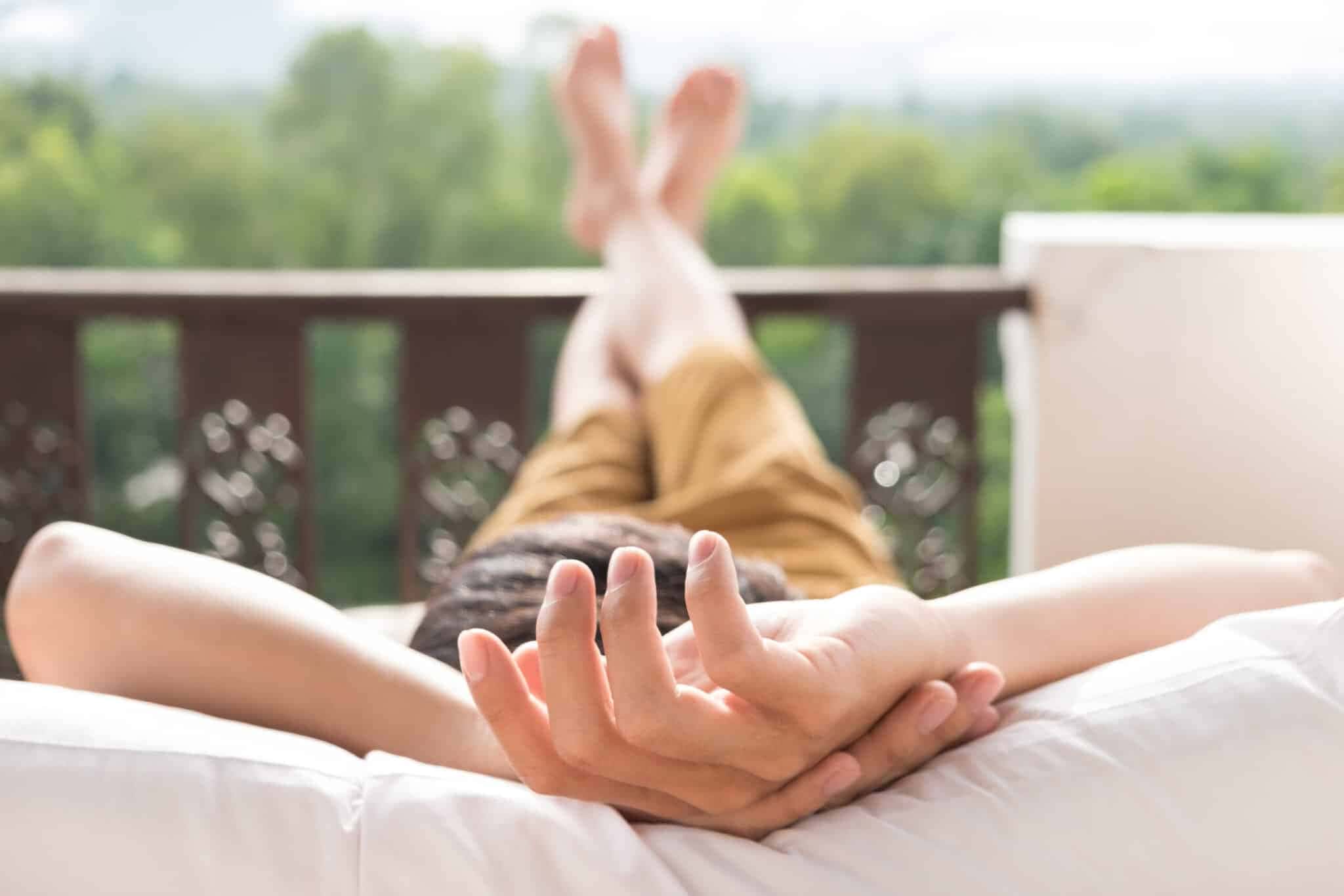 young-man-relax-bed-enjoying-mountain-view-scaled1