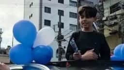 Miguel, menino que superou leucemia, faz carreata para celebrar recuperação com familiares e amigos